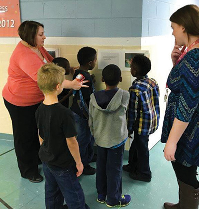 GPA elementary students on a Storywalk throughout the school