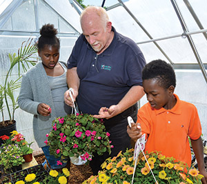 Students in the new greenhouse for Horticulture class