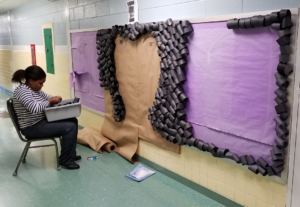 GPA student working on our new Cosmetology bulletin board