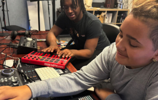 Two male high school students working in the GPA music studio